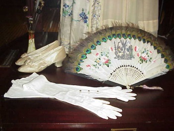 old fashioned fans and gloves